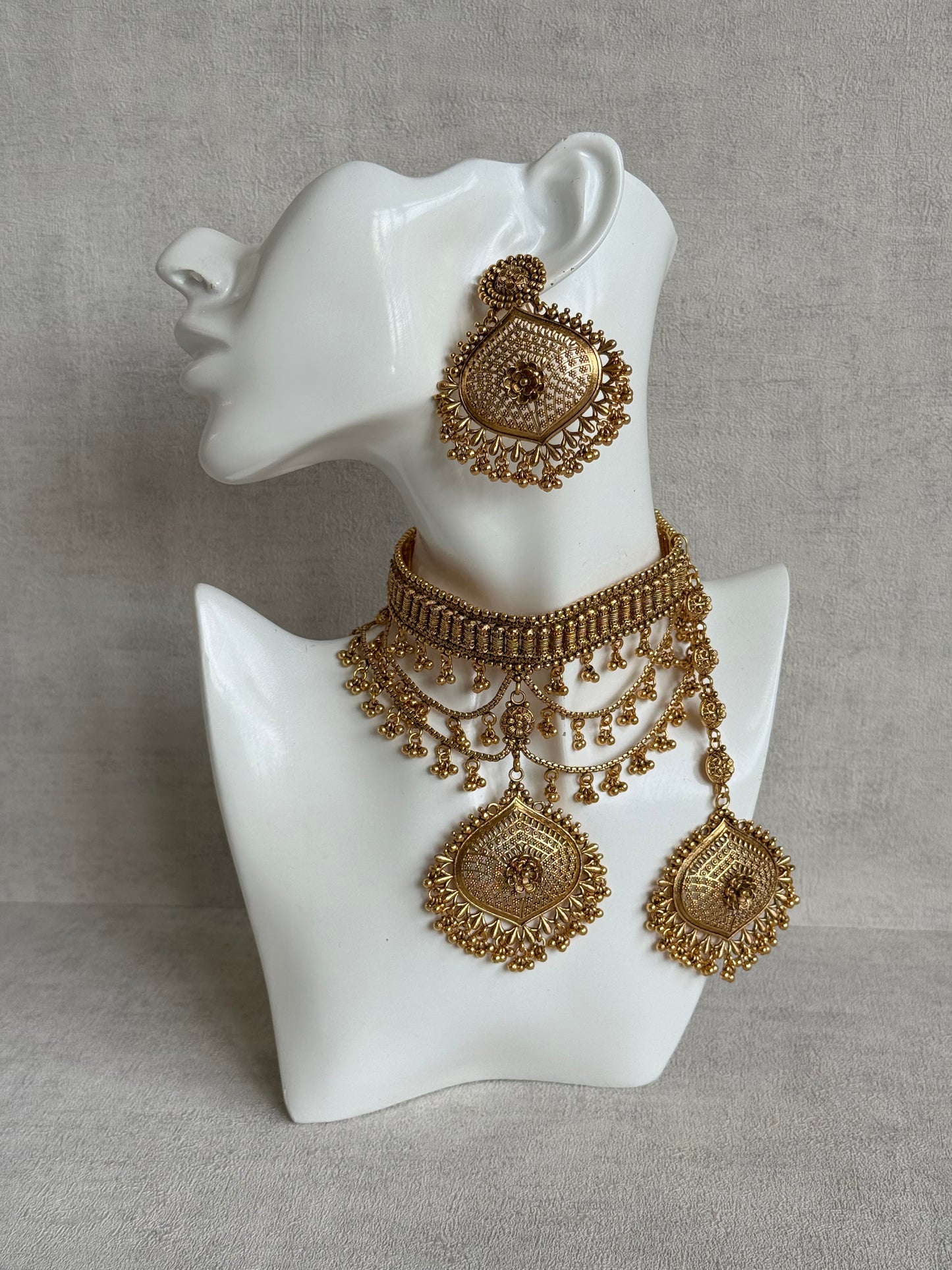 Ayura Designs Sahira Choker Set with Earrings & Tikka – Gold Engraved Choker with Floral Pendant & Ghungroo Detailing