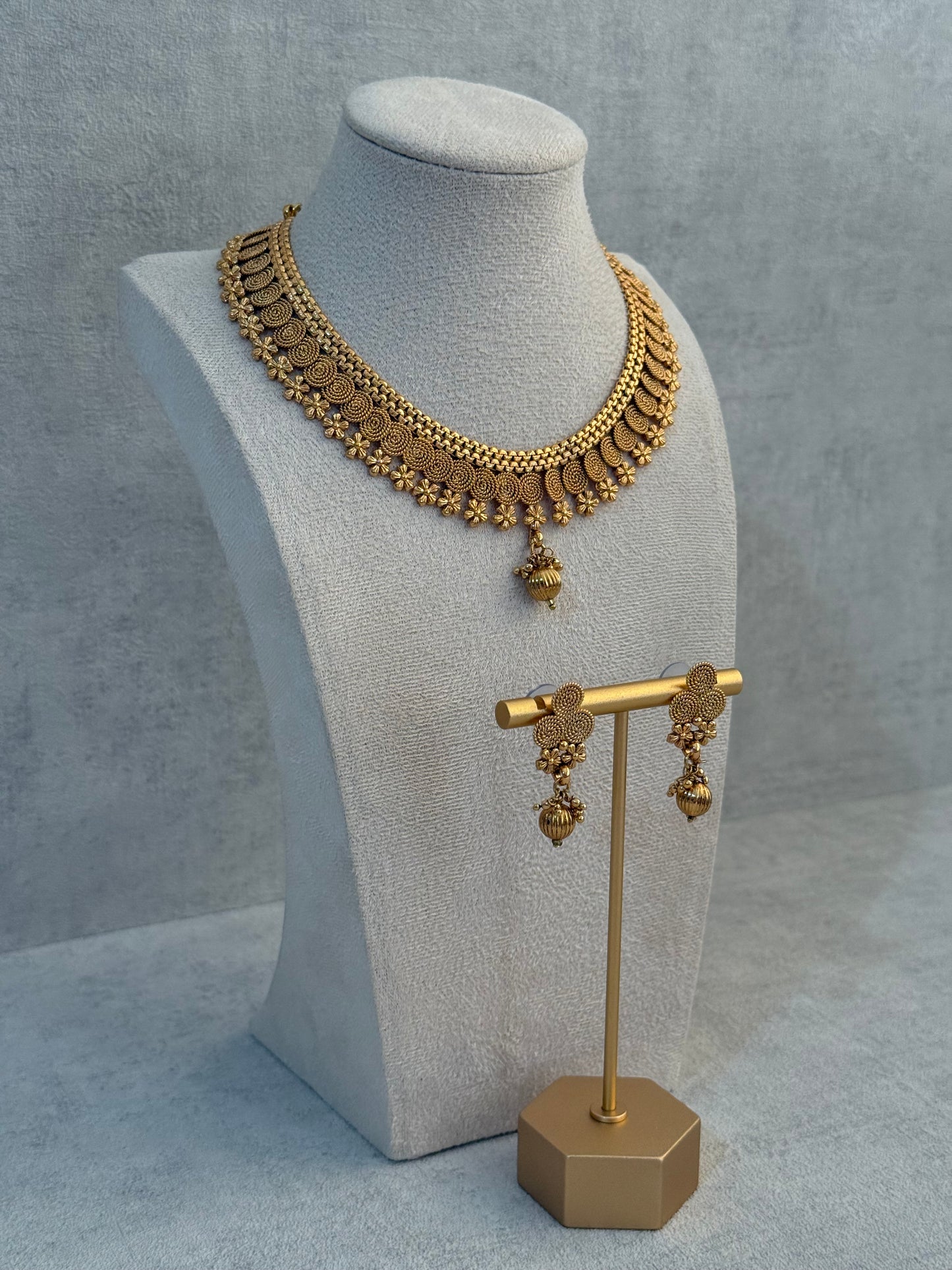 Ayura Designs Purna Set with Necklace & Earrings – Antique Gold Finish, Floral Motifs & Textured Pendant Detail