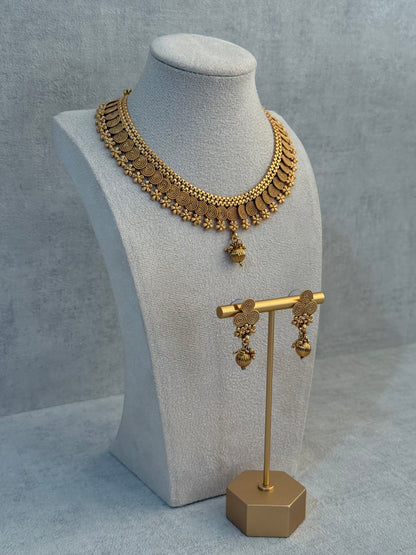 Ayura Designs Purna Set with Necklace & Earrings – Antique Gold Finish, Floral Motifs & Textured Pendant Detail