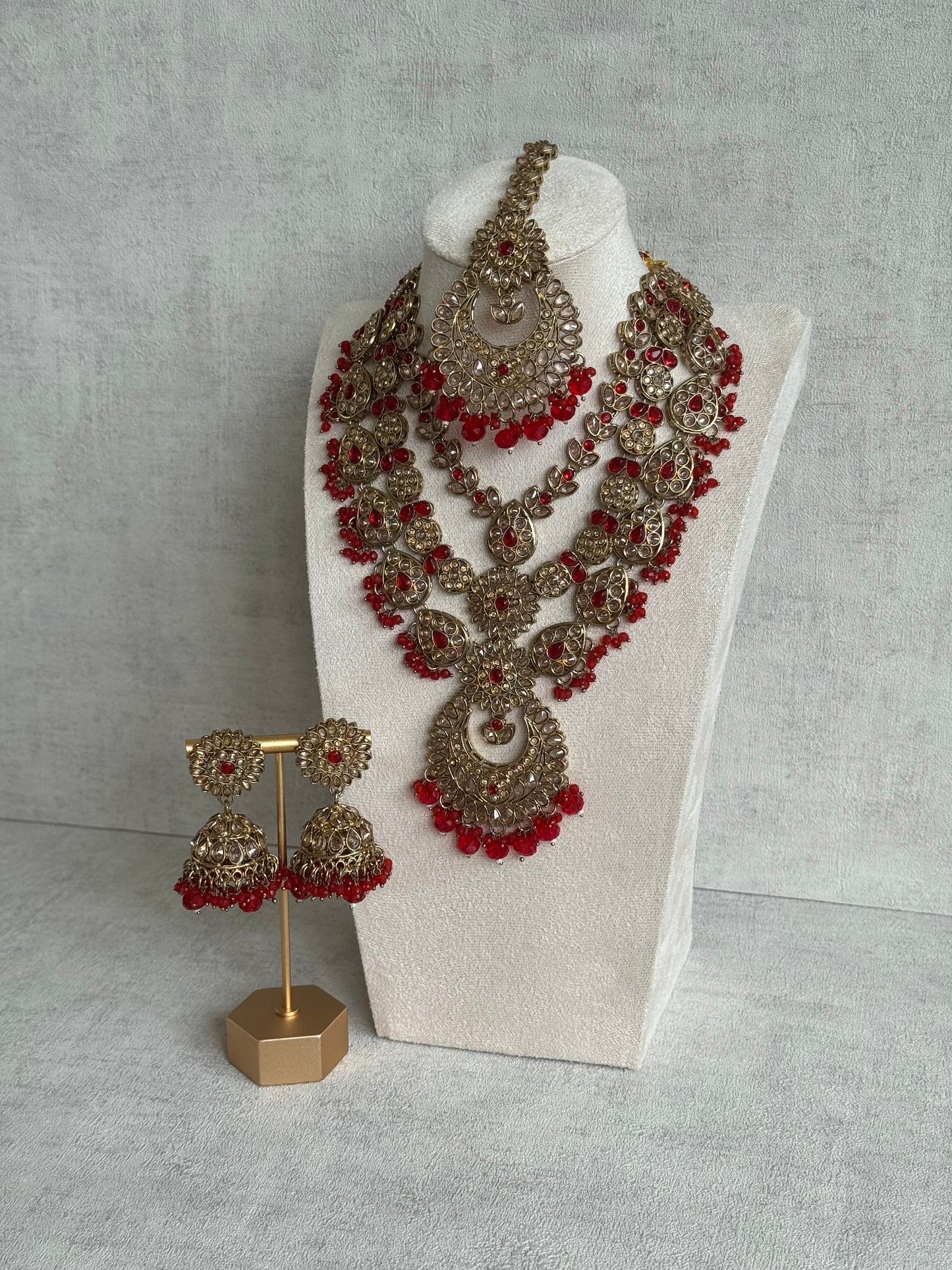 Ayura Designs Samreen Set with Tikka & Jhumkis – in Antique Gold with Red Beads & Mirror-Cut Stones