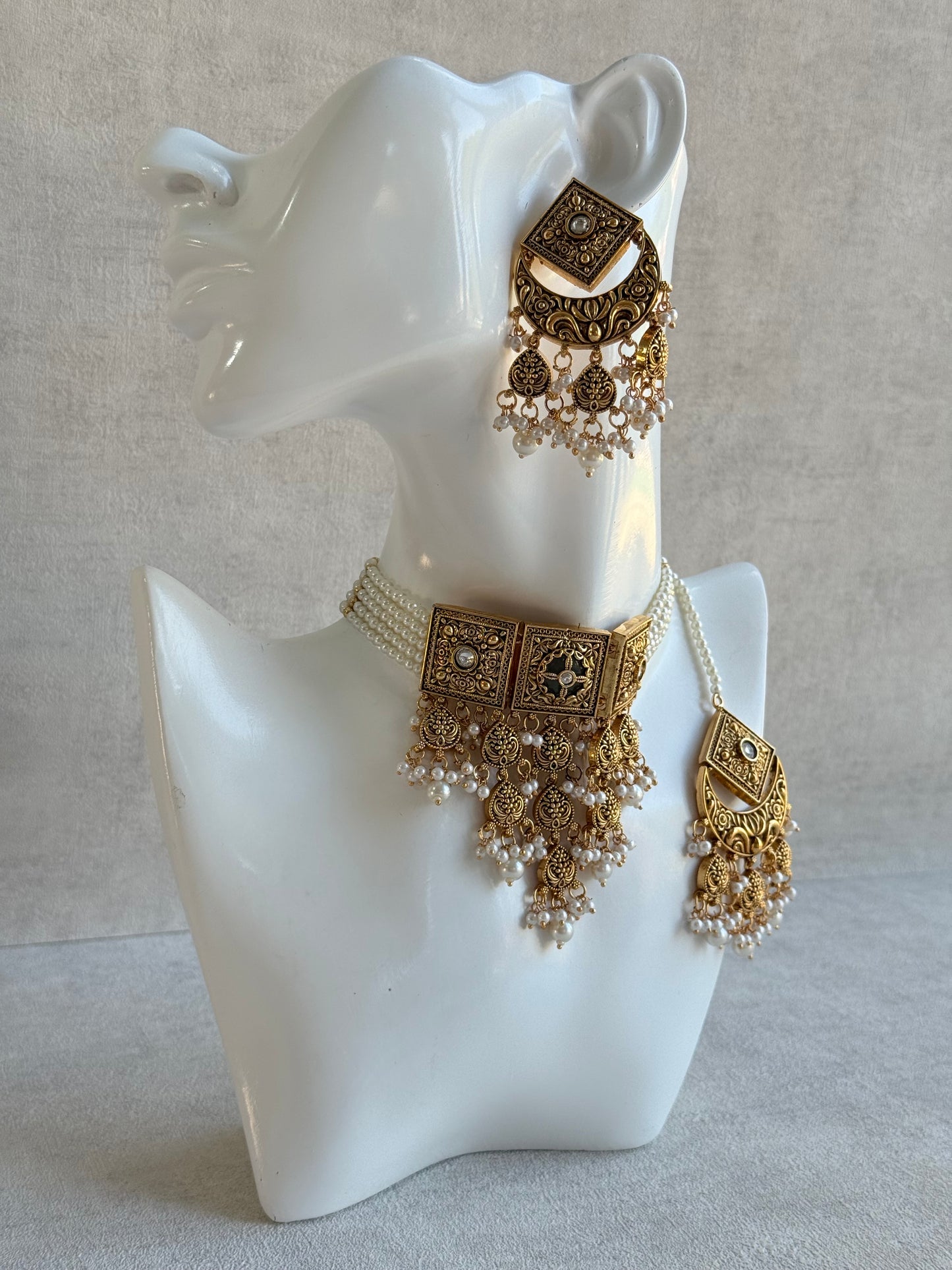 Ayura Designs Samera Choker Set with Earrings & Tikka – Ivory Beads, Pearl Detailing, Green Centre Stone, Floral Motifs & Antique Gold Finish