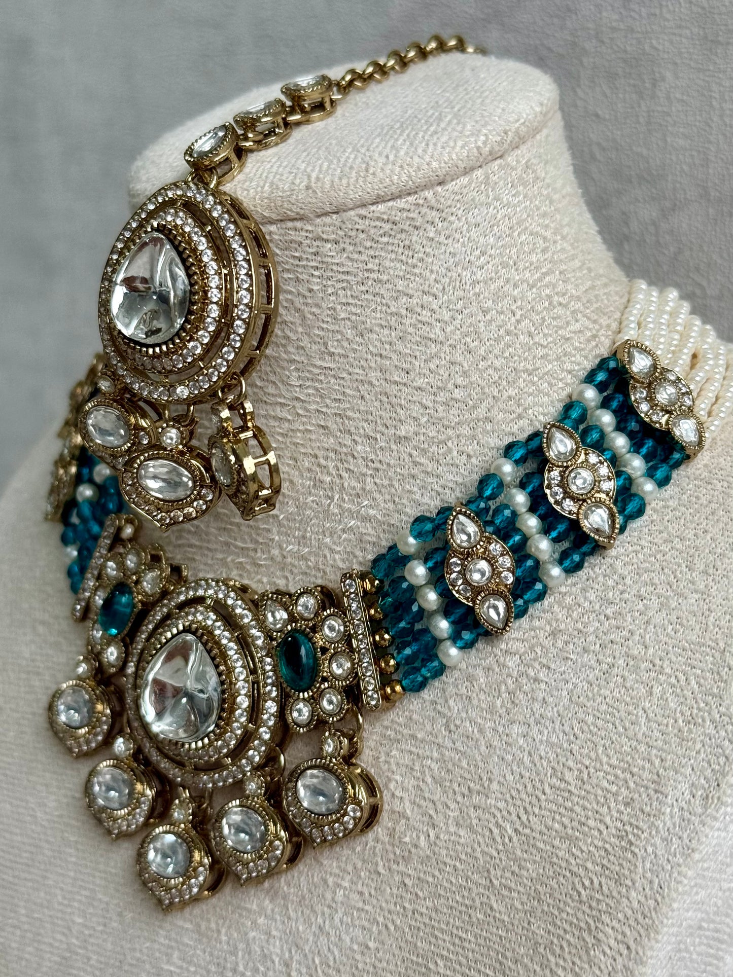 Ayura Designs Rahi Necklace Set with Earrings & Tikka – Teal Blue Stones with Mirror-Cut Detailing & Pearl Strands