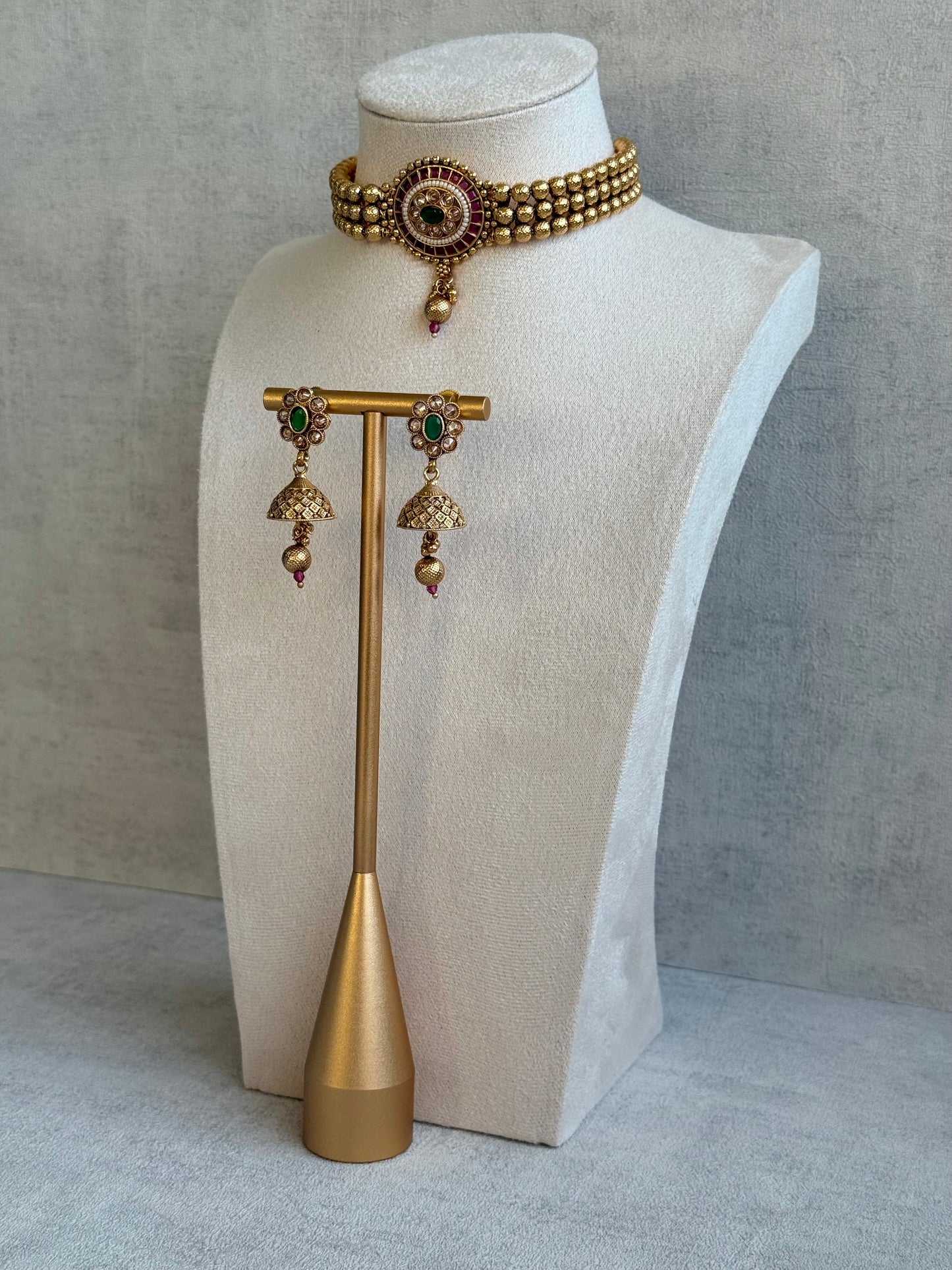 Ayura Designs Kavish Choker Set – Antique Gold Choker with Jhumkis in Rani Pink & Emerald Green with Pearl Detailing