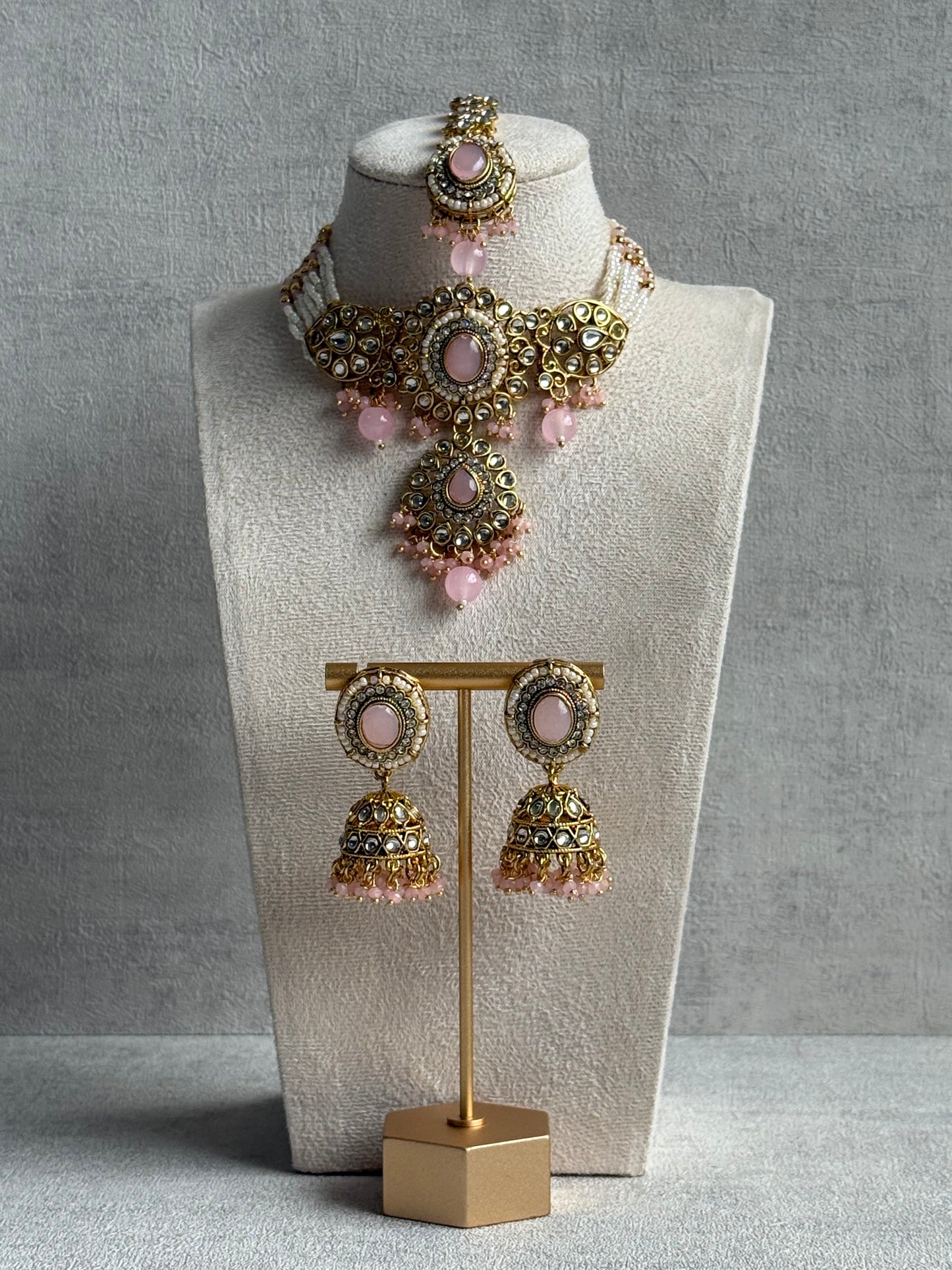 Ayura Designs Muskaan Set – Choker, Jhumkis & Tikka with Blush Pink Beads, Kundan Stones & Antique Gold Finish