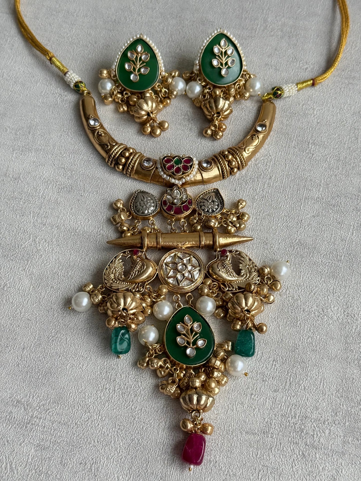 Ayura Designs Zaqsh Collar Necklace Set with Earrings – Antique Gold Peacock Pendant with Emerald Green Stones & Pearl Detailing