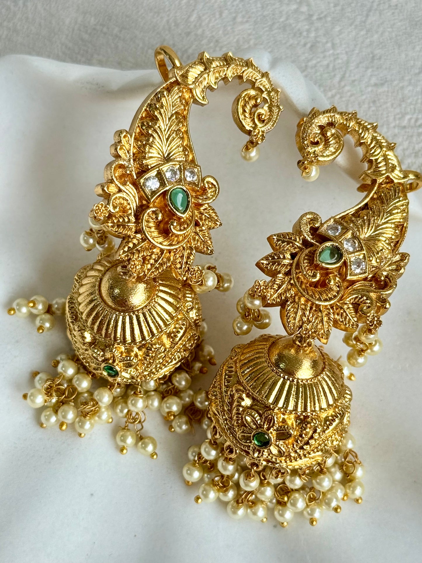 Ayura Designs Anika Jhumkis – Gold Half Ear Cuffs with Peacock Motif, Green Stone Accents, Kundan Crystals & Pearl Jhumka Drops