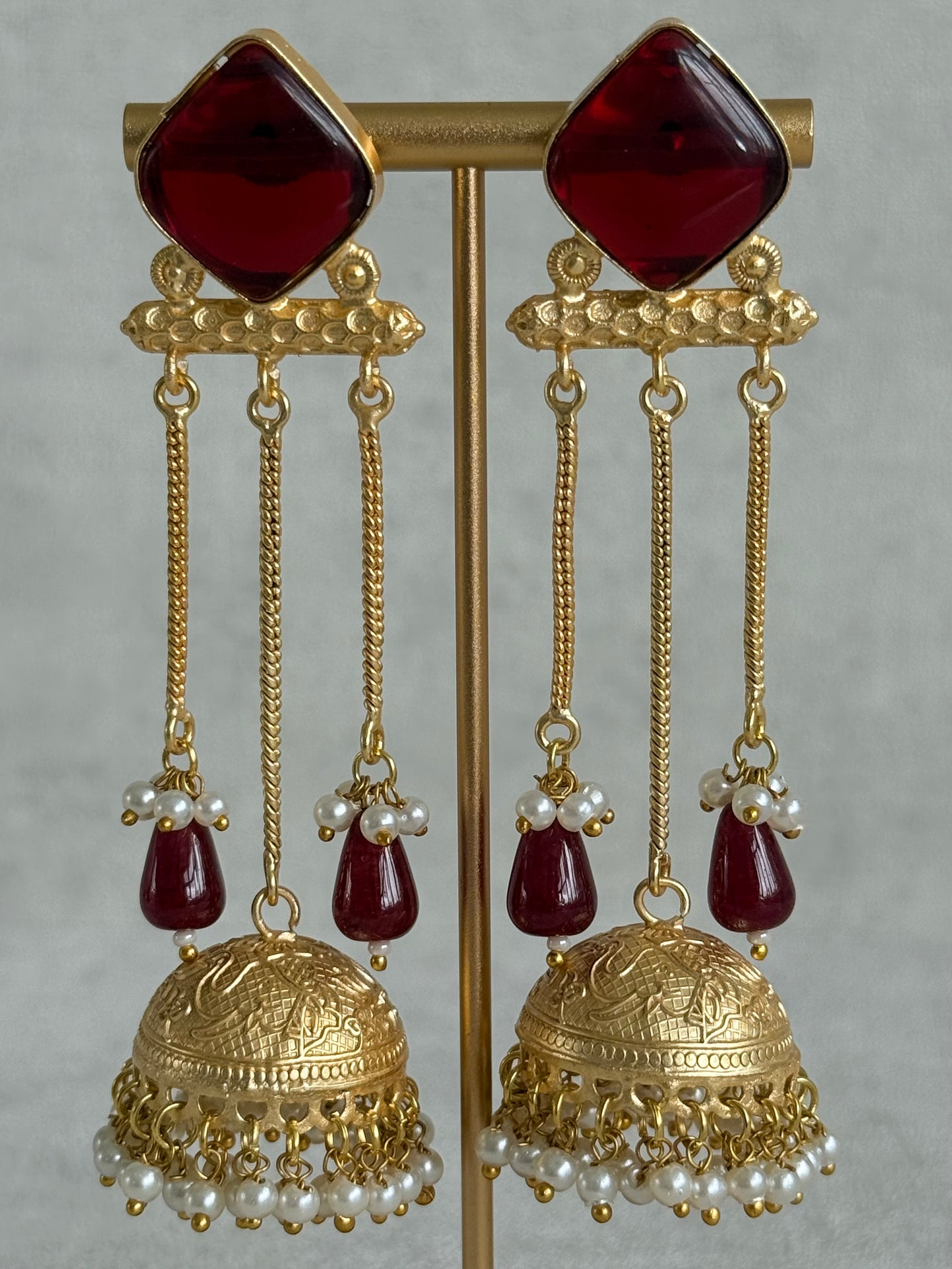Ayura Designs Mahwina Jhumkis – Ruby Red Stones with Chain Drops & Pearl Detailing