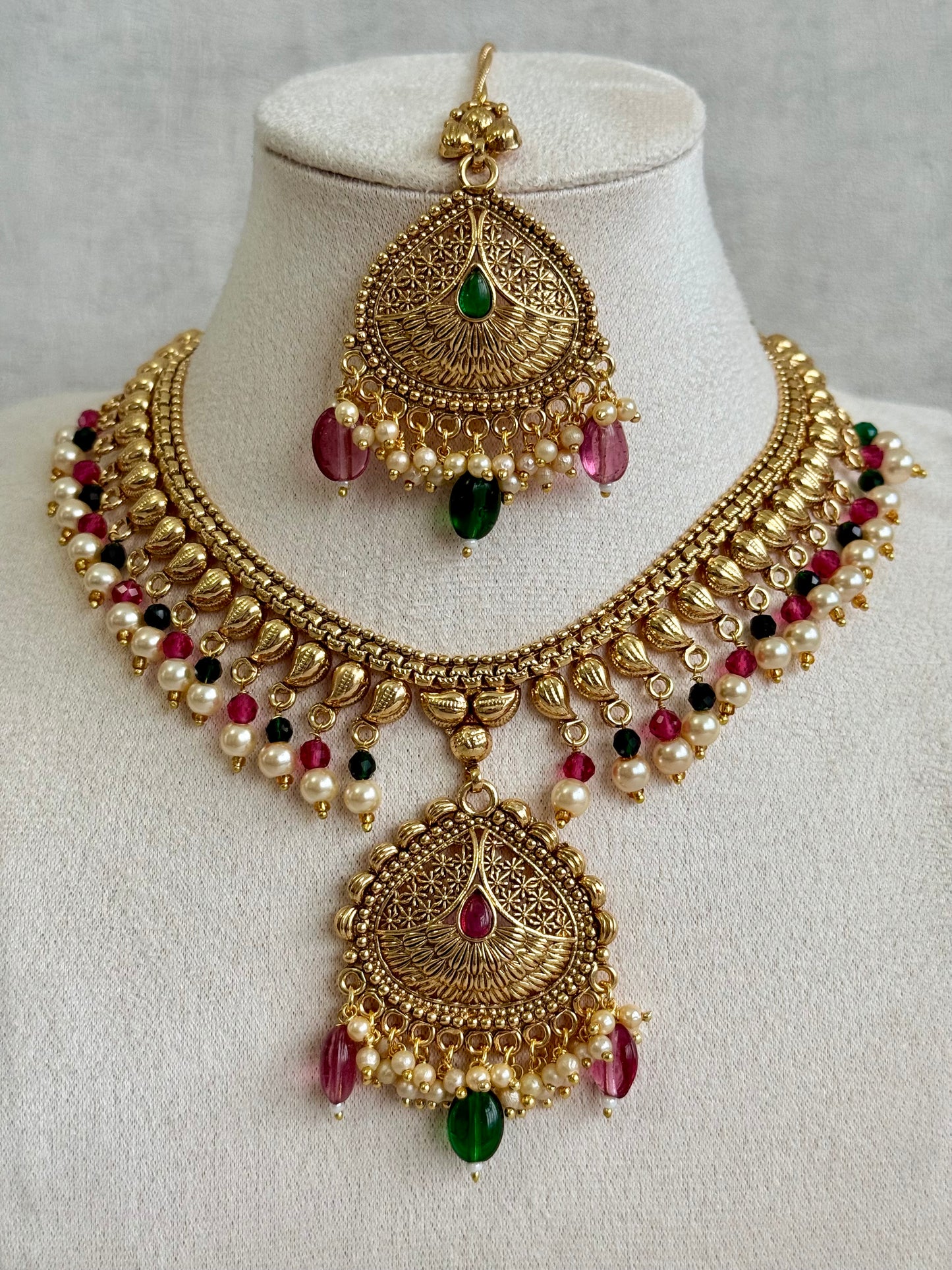 Ayura Designs Hamida Set with Necklace, Earrings & Tikka – Antique Gold with Ruby Pink and Emerald Green Beads & Pearl Detailing