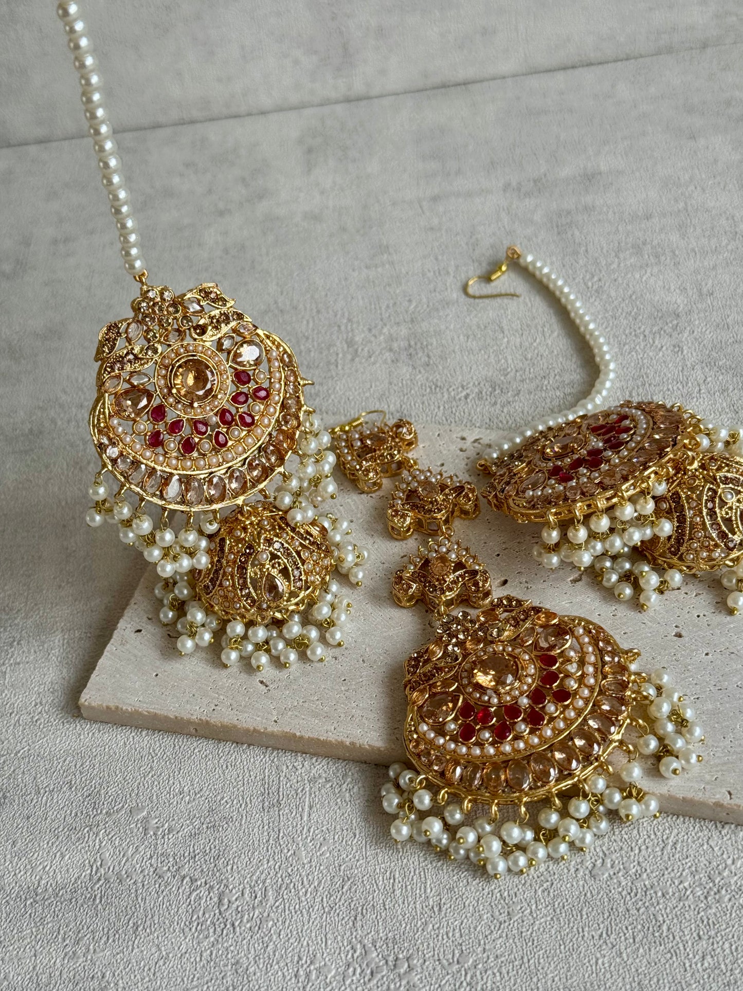 Ayura Designs Zarnigar Tikka Set with Sahare Jhumkis – Champagne & Ruby Stones with Pearl Detailing