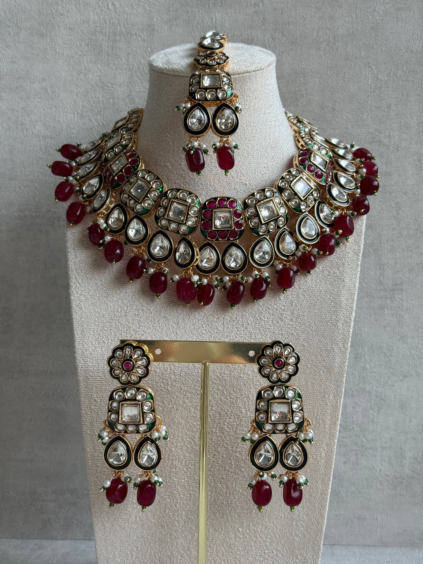 Ayura Designs Salma Set – Necklace, Earrings & Tikka with Mirror-Cut Kundan, Ruby Red Beads, Emerald Green Meenakari & Gold Finish