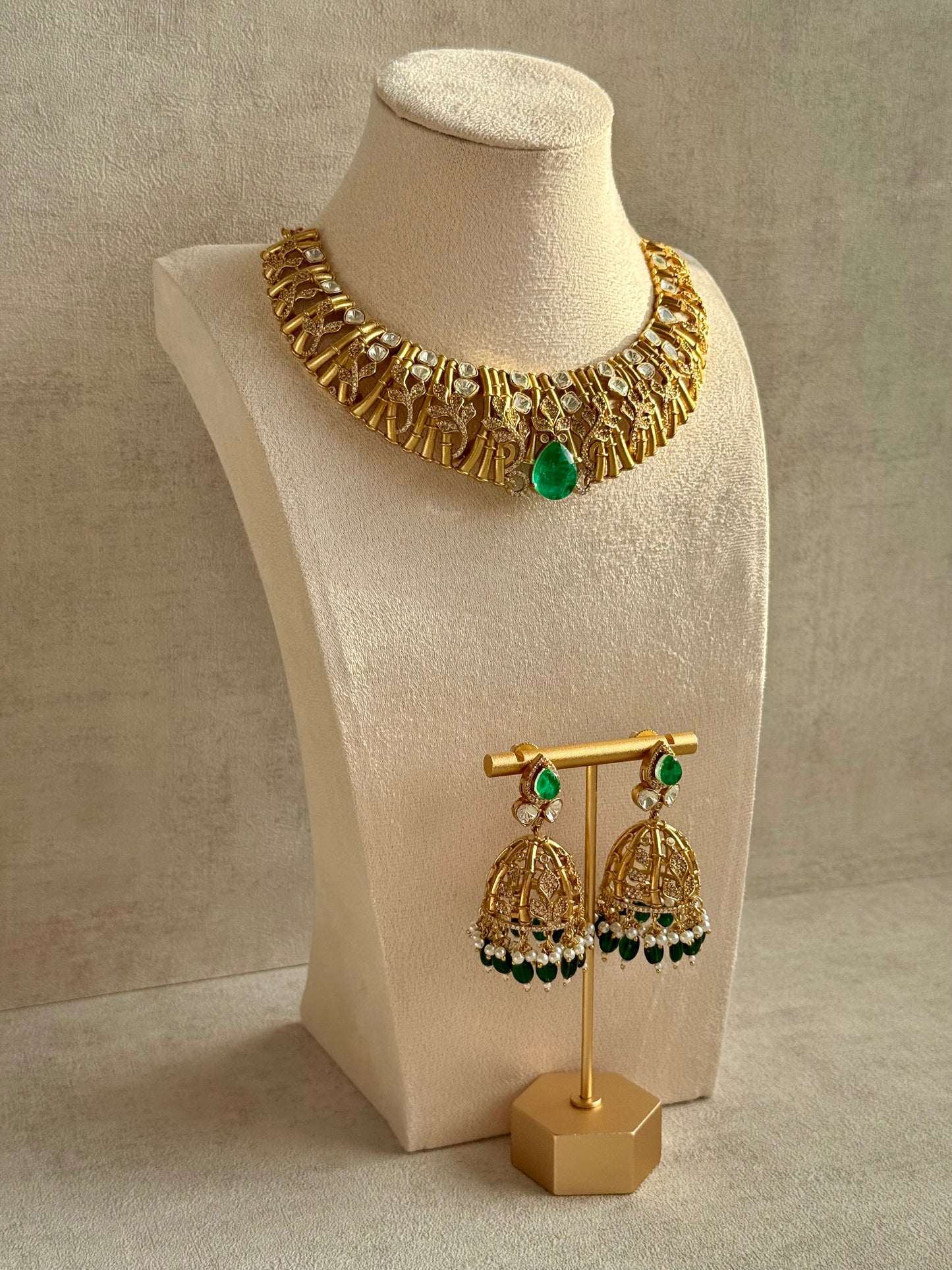 Ayura Designs Rami Collar Set with Jhumkis – Sculpted Gold Collar with Emerald Green Stone and Crystal Detailing