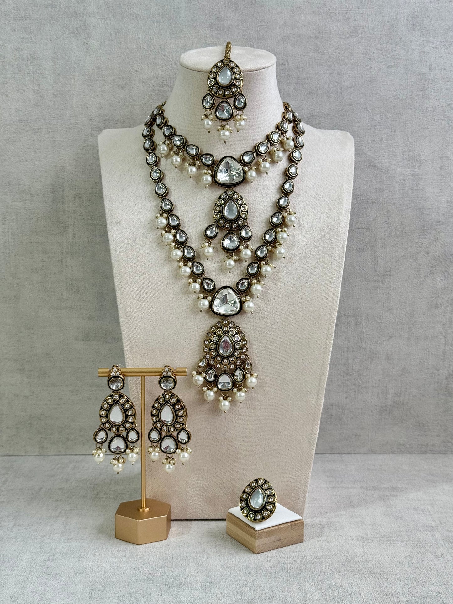 Ayura Designs Kalika Set with Necklace, Earrings, Tikka & Ring – Polki-Style Stones with Antique Green Enamel Detailing & Pearl Drops