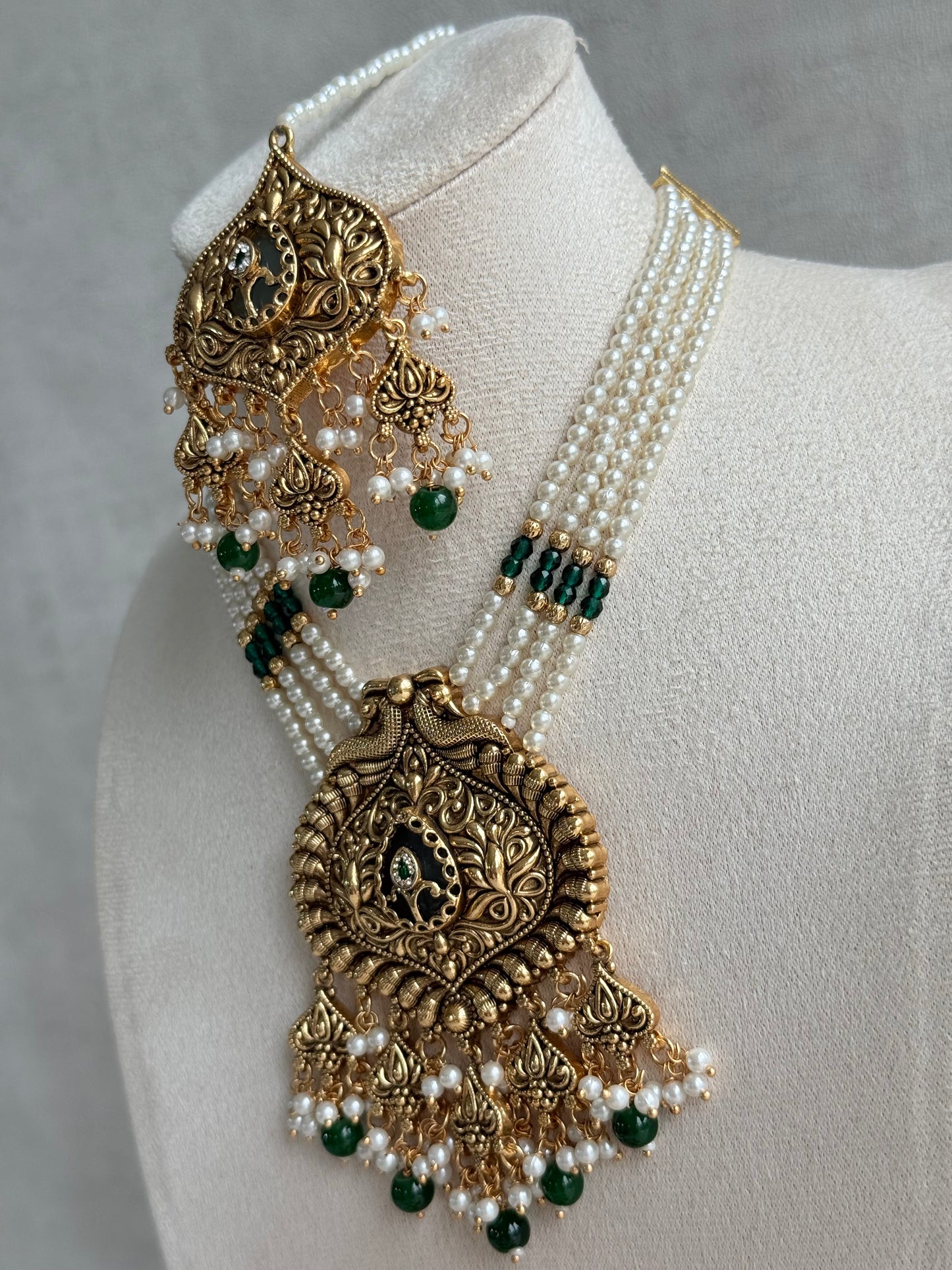 Ayura Designs Afia Necklace Set with Earrings & Tikka – Antique Gold, Emerald Green Beads, Green Centre Stone & Peacock Motifs