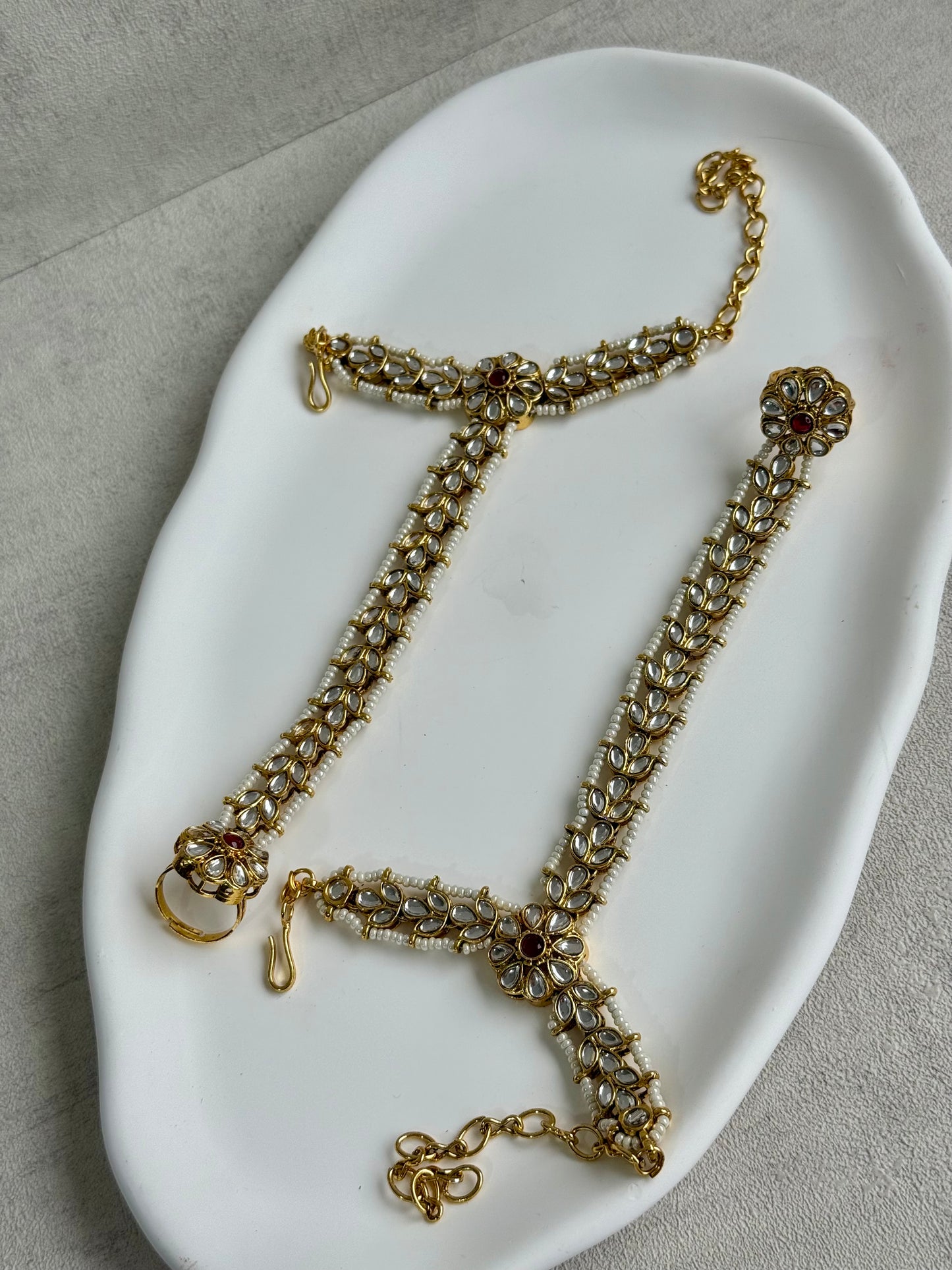 Ayura Designs Ruya Haathphool – Mirror-Cut Stones with Ruby Accents & Pearl Detailing