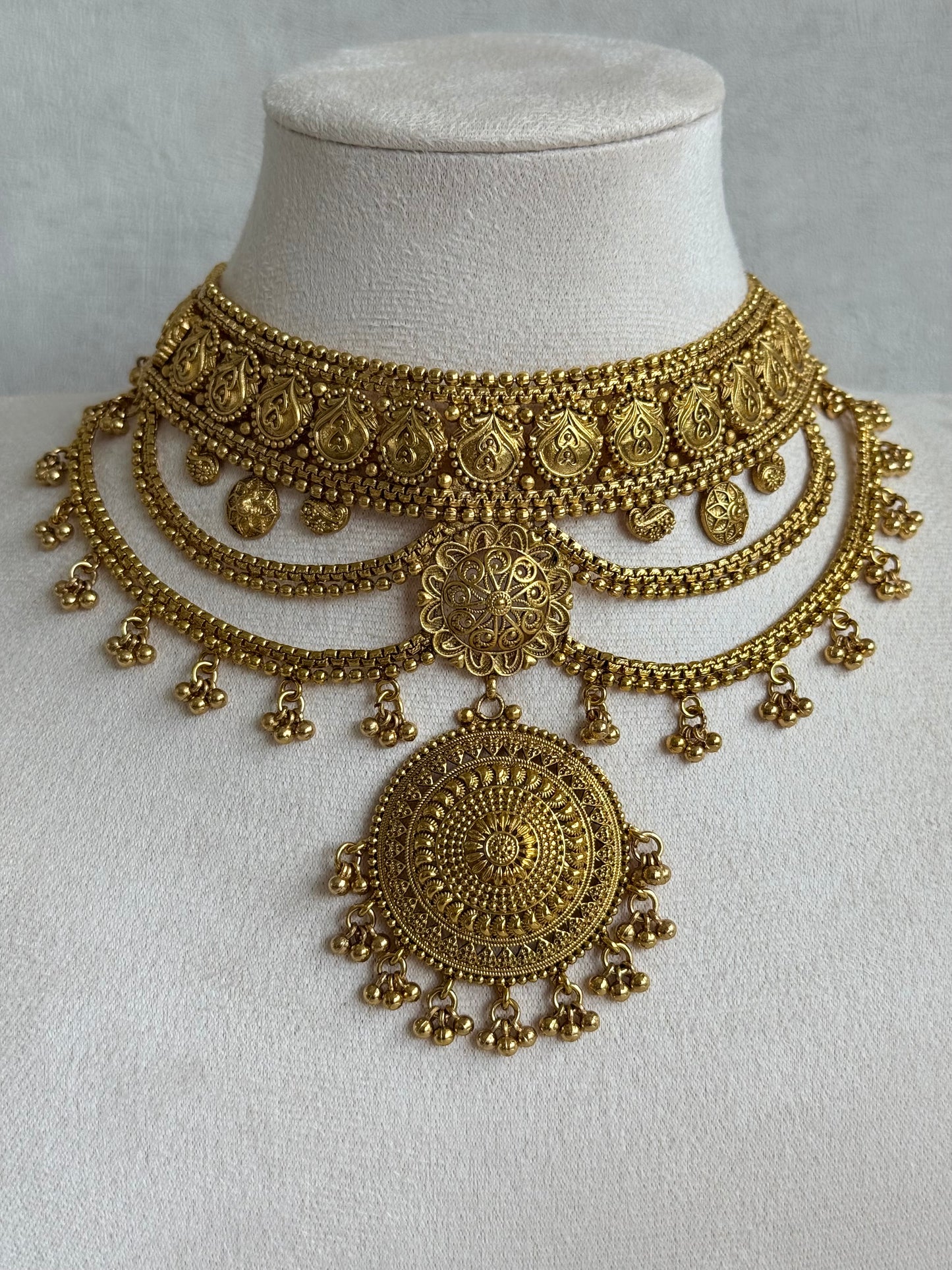 Ayura Designs Subha Choker Set with Earrings & Passa – Antique Gold Engraved Medallions, Layered Chains & Ghungroo Drops