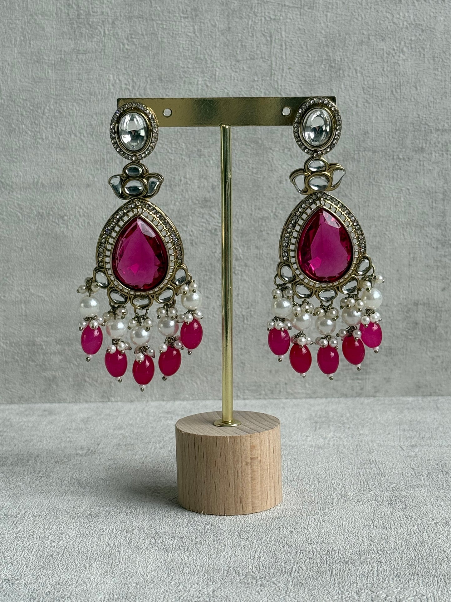 Ayura Designs Nageen Earrings – Antique Gold Jhumkis with Hot Pink Stones, Mirror-Cut Accents & Pearl Drops