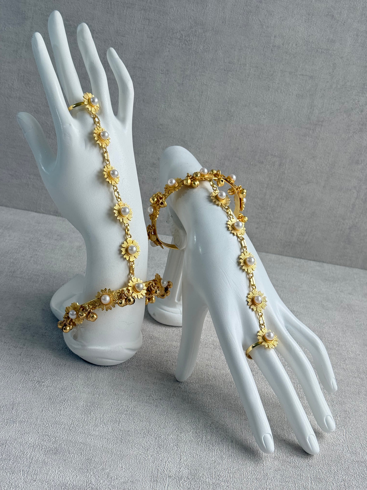 Ayura Designs Avanti Haathphool Set of 2 – Gold Finish Floral Hand Harness with Ivory Pearls & Ghungroo Detailing