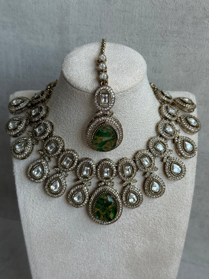 Ayura Designs Aurora Set with Earrings & Tikka – Emerald Green Stone & Mirror-Cut Accents in Antique Gold Finish