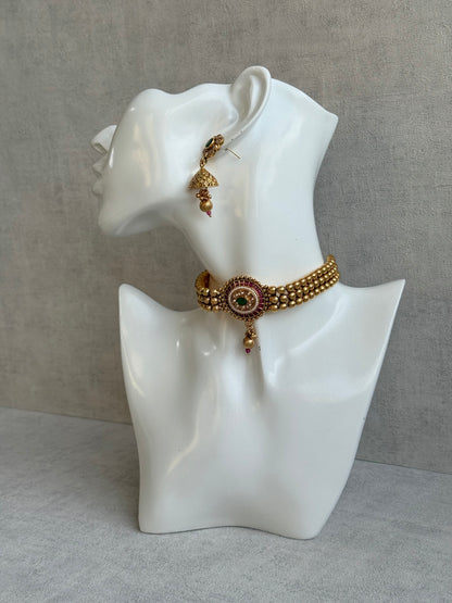 Ayura Designs Kavish Choker Set – Antique Gold Choker with Jhumkis in Rani Pink & Emerald Green with Pearl Detailing