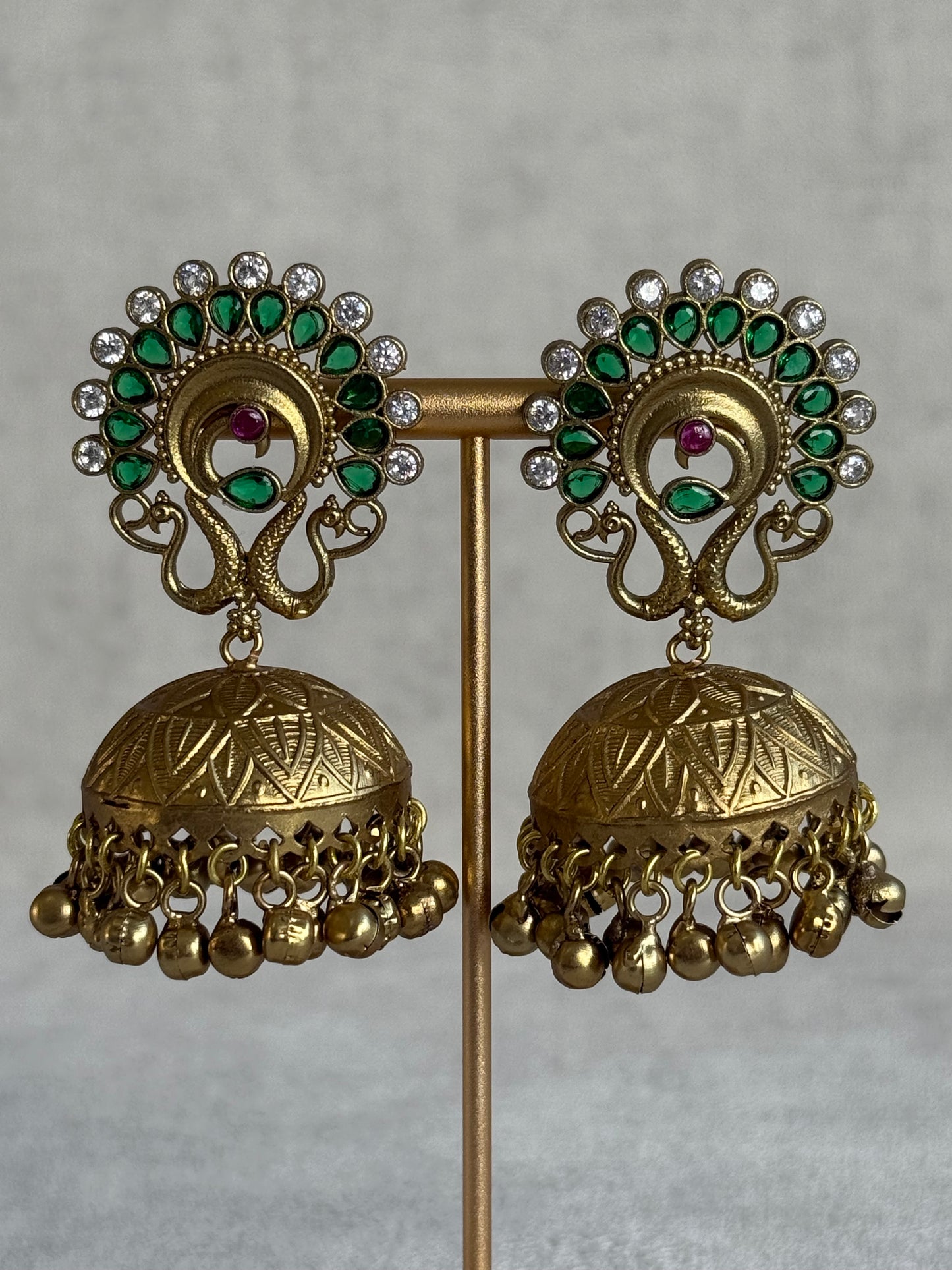 Ayura Designs Moraya Jhumkis – Emerald Green Peacock Motif with Antique Gold Detailing