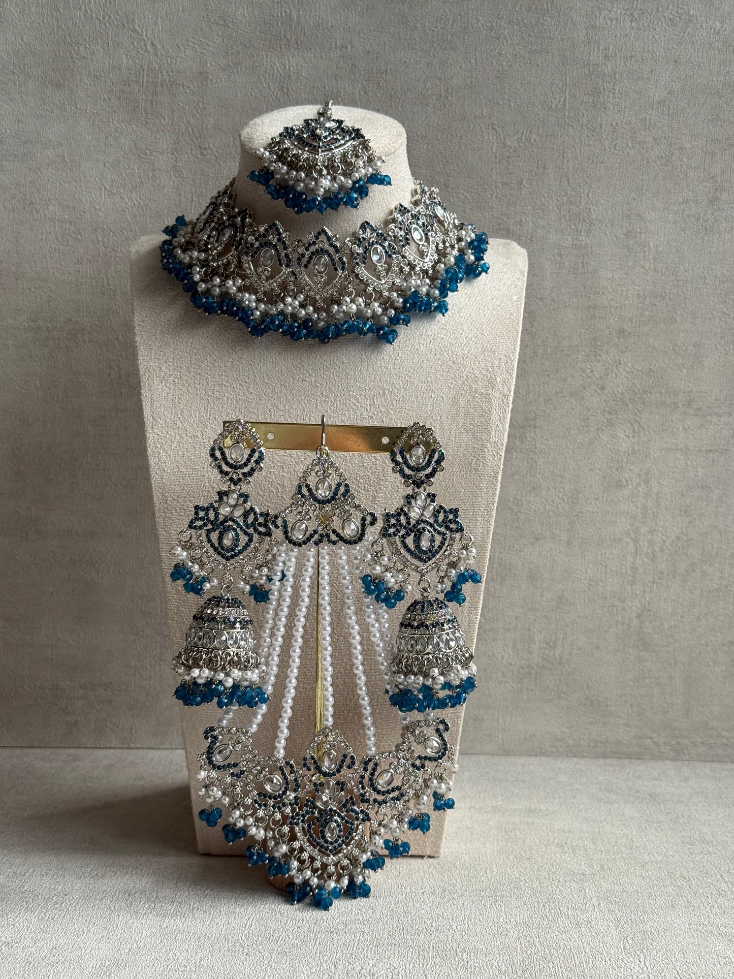 Ayura Designs Wania Set with Jhumkis, Tikka & Passa – Peacock Blue Beads, Mirror-Cut Stones & Antique Silver Finish