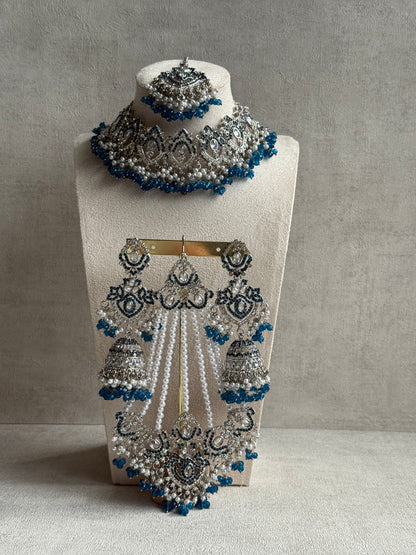 Ayura Designs Wania Set with Jhumkis, Tikka & Passa – Peacock Blue Beads, Mirror-Cut Stones & Antique Silver Finish