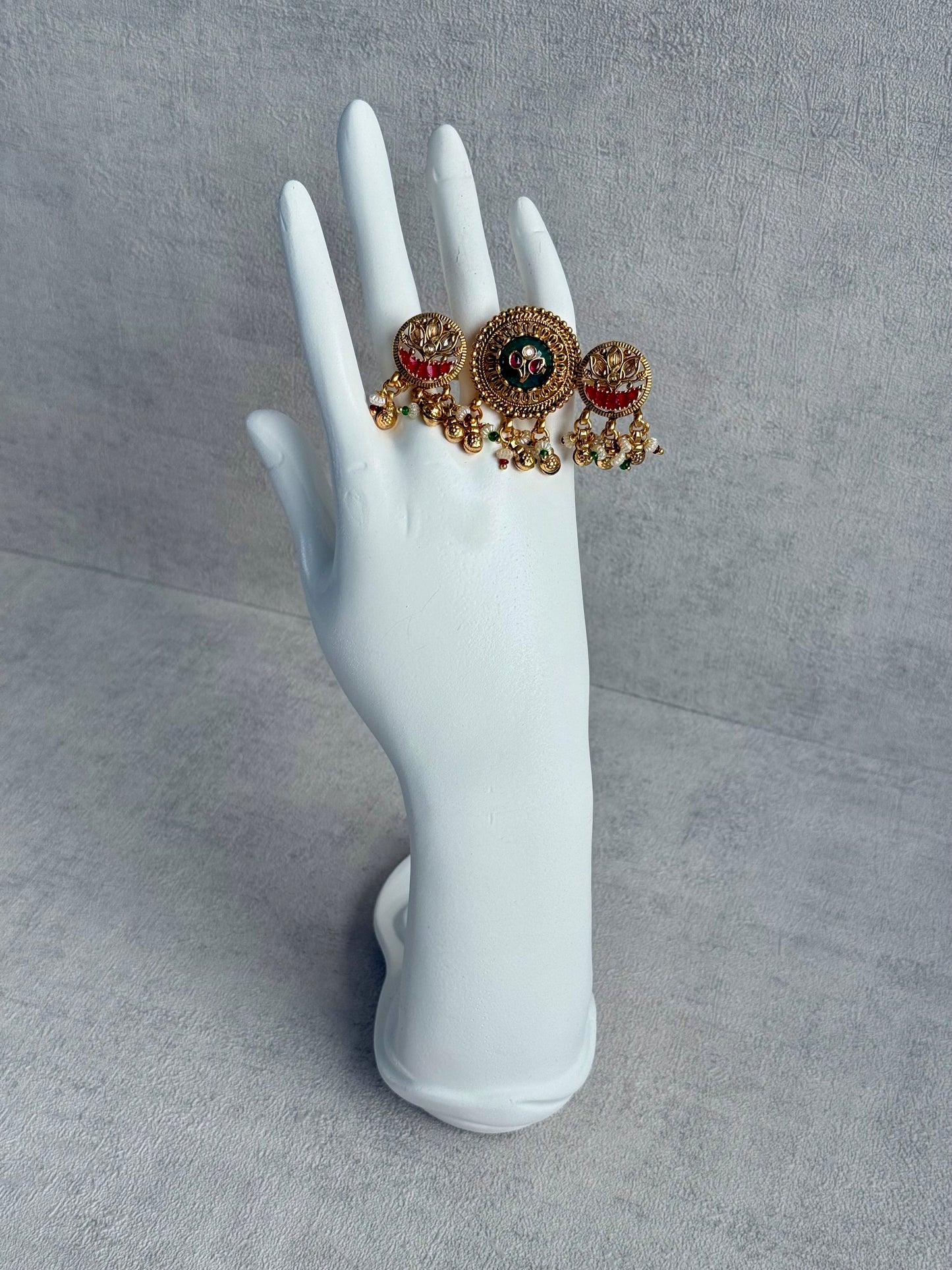 Ayura Designs Raha Adjustable Ring – Antique Gold Lotus Motifs with Emerald Green & Rani Pink Stones, Pearl Drops & Ghungroo Detailing