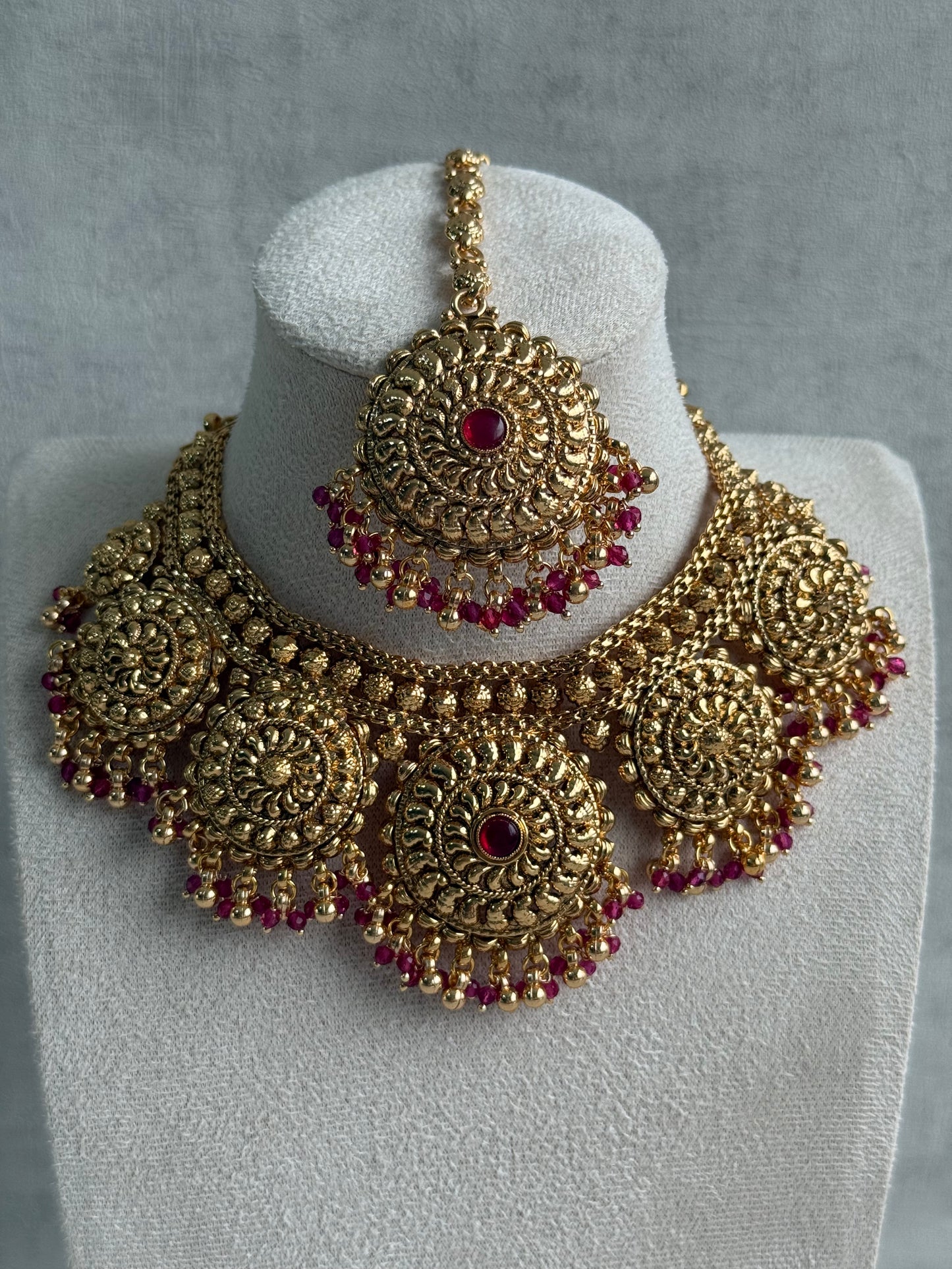 Ayura Designs Rummy Set – Statement Necklace, Earrings & Tikka with Rani Pink Beads and Polished Gold Finish