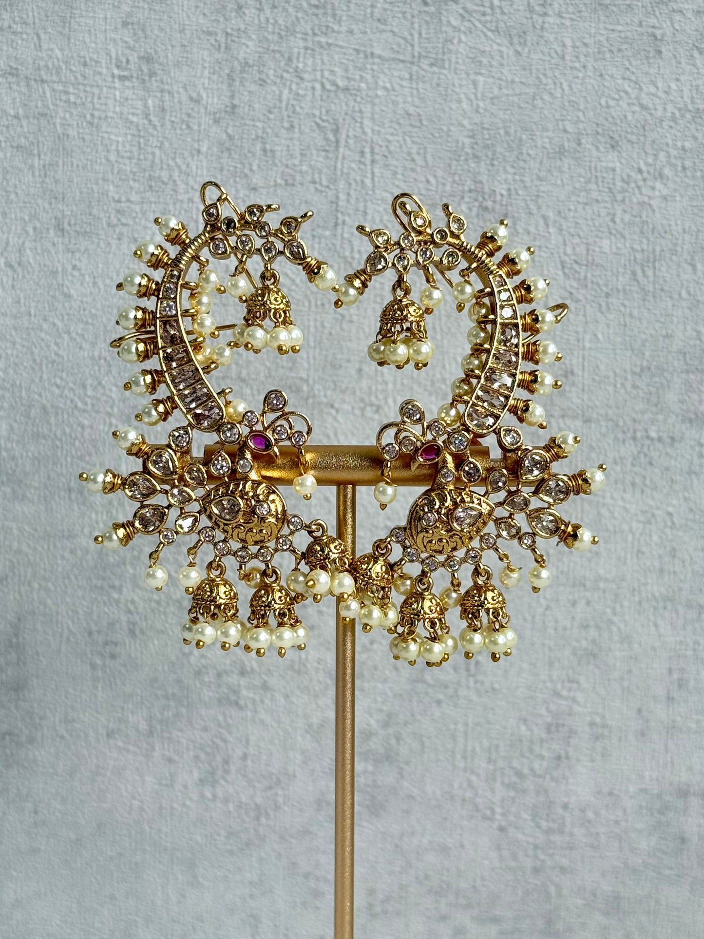 Ayura Designs Megha Half Ear Cuff Earrings – Gold Peacock Motif with Kundan Crystals, Pink Stone Accents & Pearl Jhumka Drops