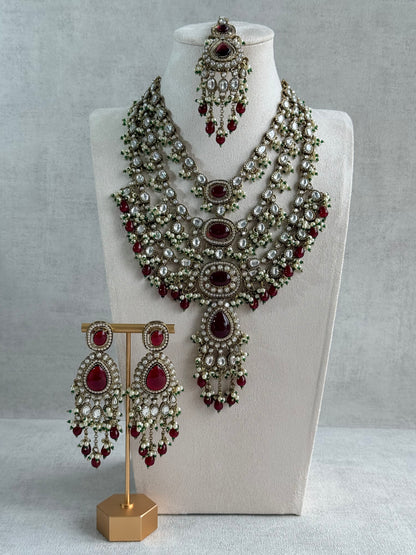Ayura Designs Sahra Bridal Set with Earrings & Tikka – Ruby Red, Kundan Stones, Pearls & Emerald Green Accents in Antique Gold Finish