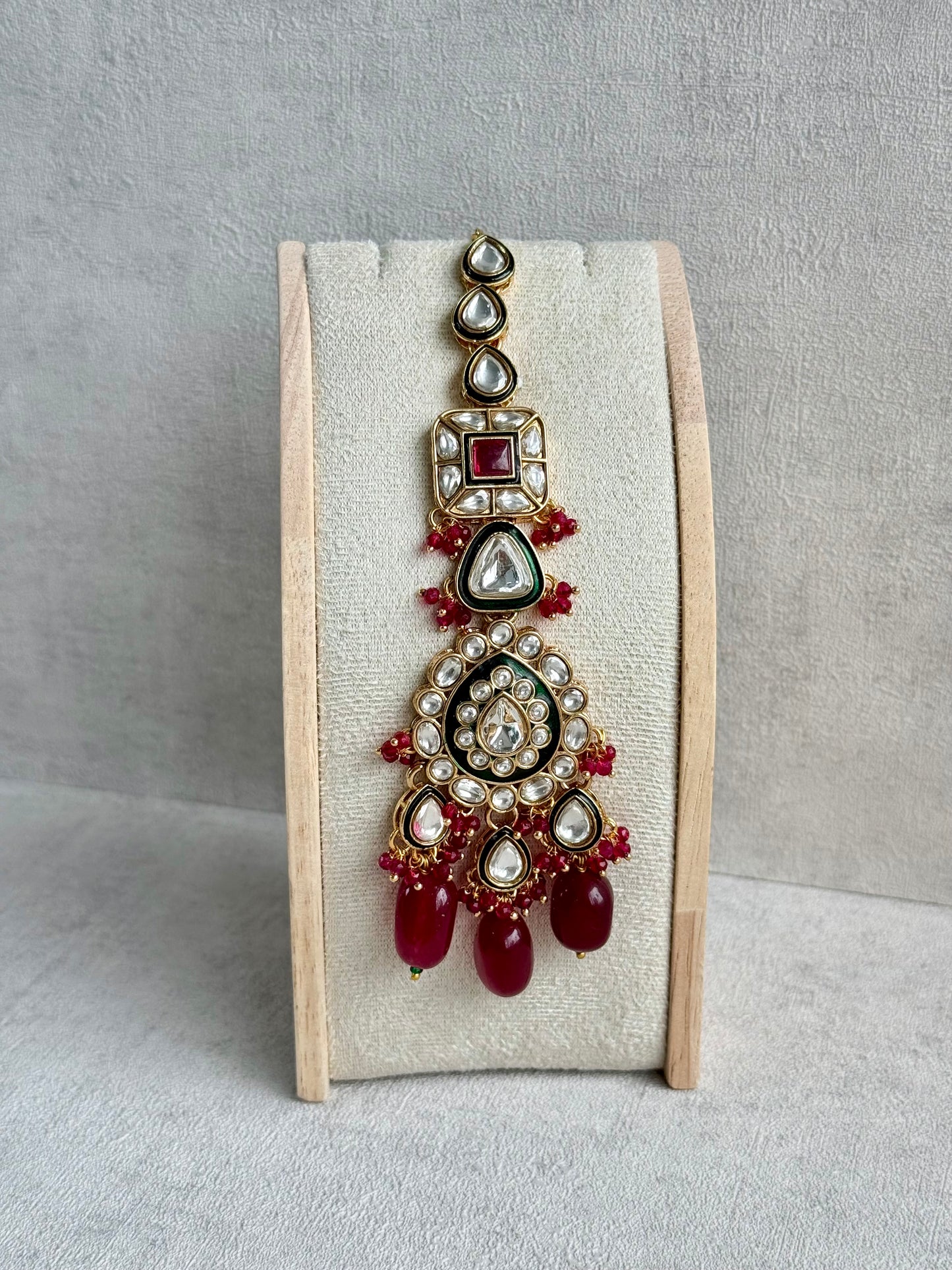 Ayura Designs Zahira Bridal Set with Necklace, Earrings & Tikka – Kundan Detailing with Green Enamel, Ruby Pink Stones & Maroon Bead Drops