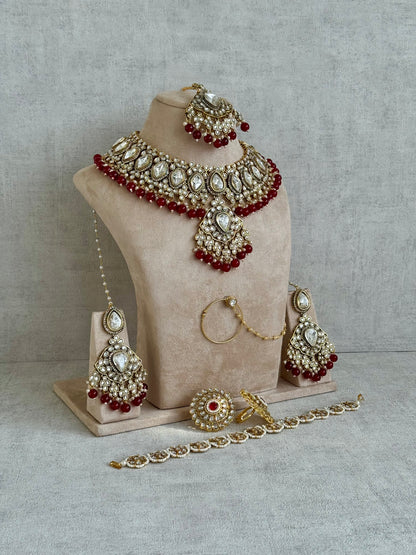 Ayura Designs Gulbahar Bridal Set with Necklace, Jhumkis, Tikka, Nath, Ring & Sheeshphool – Jadau Kundan Craftsmanship with Mirror-Cut Polki, Red Beads & Antique Gold Finish