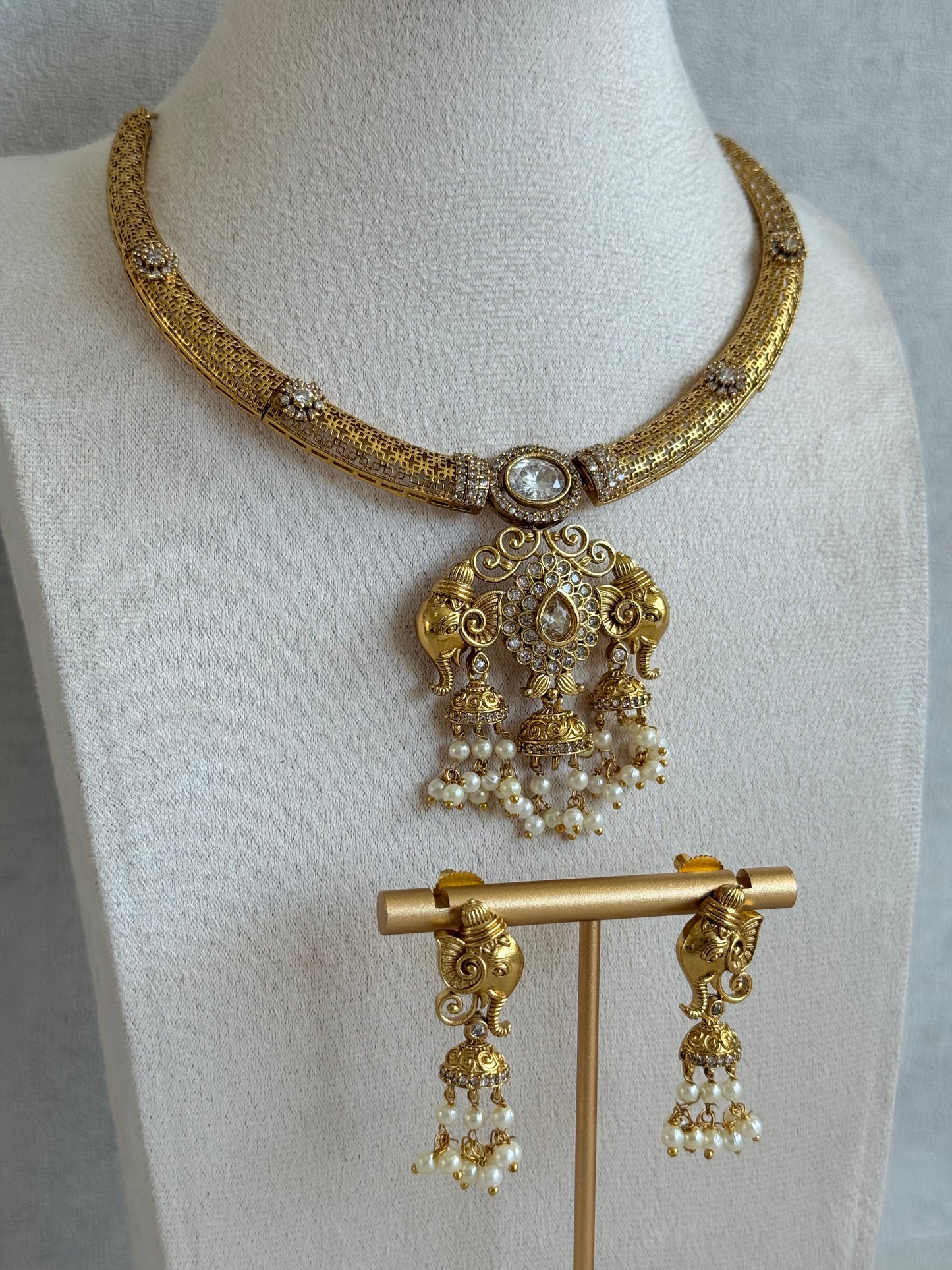 Ayura Designs Wadha Collar Necklace Set with Earrings – Gold Elephant Pendant & White Crystal Detailing