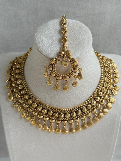 Ayura Designs Falaq Necklace Set with Earrings & Tikka – Gold Finish with Layered Chain, Floral & Shell Drop Detailing