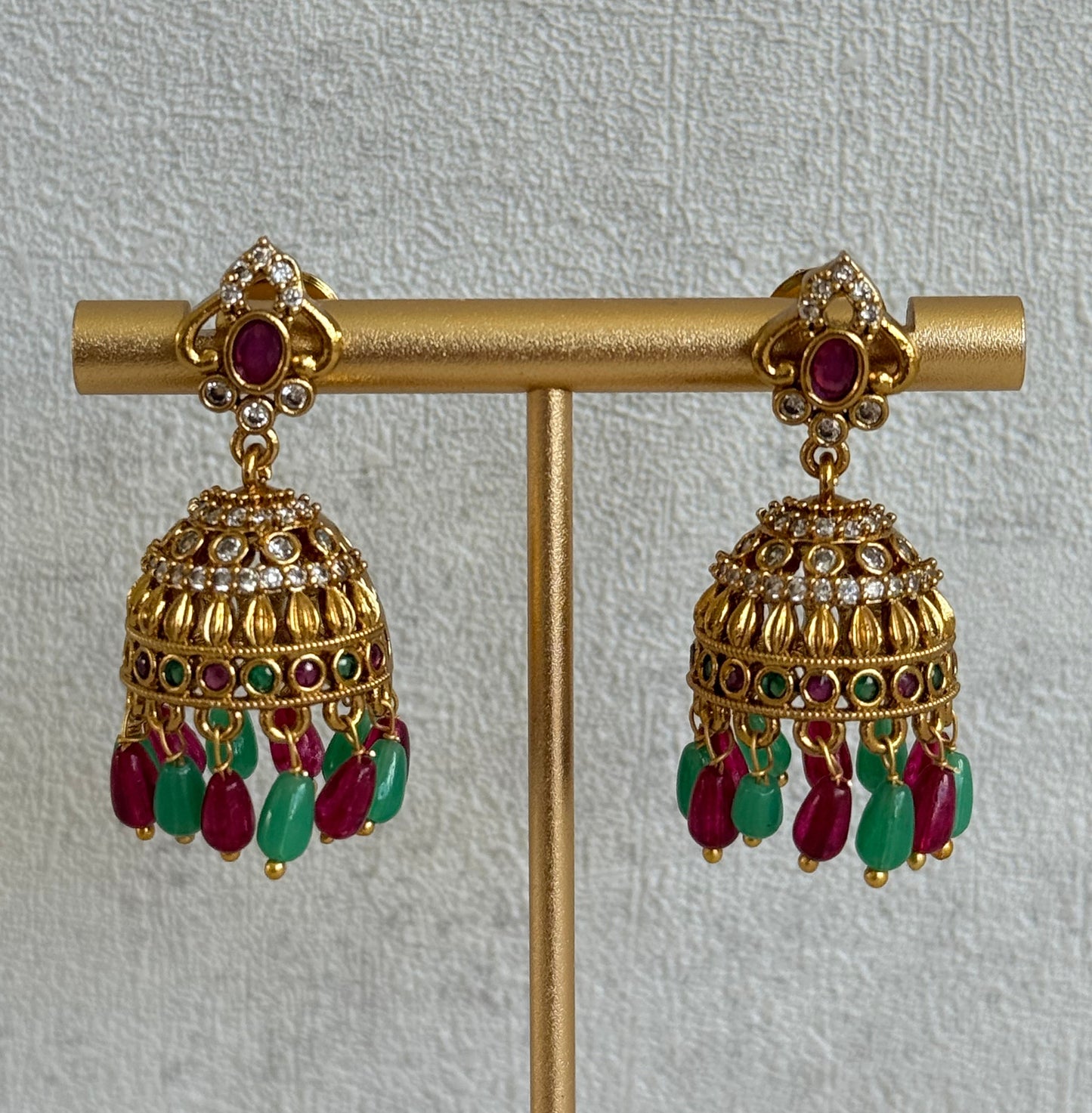Ayura Designs Devi Jhumkis – Ruby Pink & Green Stones with Clear Stone Detailing & Gold Finish