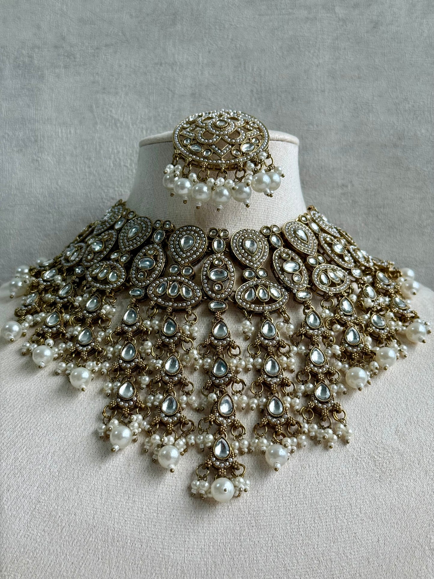 Ayura Designs Tanya Bridal Set with Necklace, Earrings & Tikka – Ivory Pearls, Mirror-Cut Stones & Antique Gold Finish