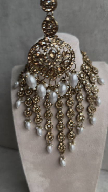 Ayura Designs Sameena Set – Opulent Champagne Gold Adorned with Luminous White Pearls Featuring a Statement Necklace, Tikka, and Chandelier Earrings