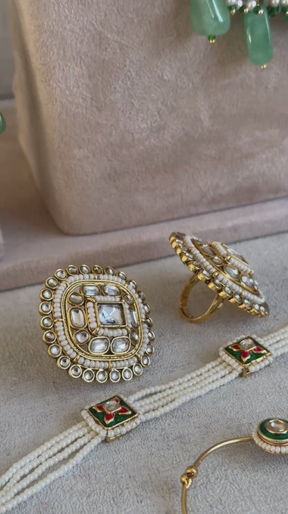 Ayura Designs Malika Bridal Set with Necklace, Jhumkis, Tikka, Nath, Ring & Sheeshphool – Jadau Kundan Craftsmanship with Mirror-Cut Polki, Jade-Toned Drops, Ruby Accents & Antique Gold Finish