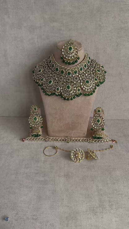 Ayura Designs Meherbano Bridal Set with Necklace, Jhumkis, Tikka, Nath, Ring & Sheeshphool – Jadau Kundan Craftsmanship with Mirror-Cut Polki, Emerald Green Stones & Antique Gold Finish