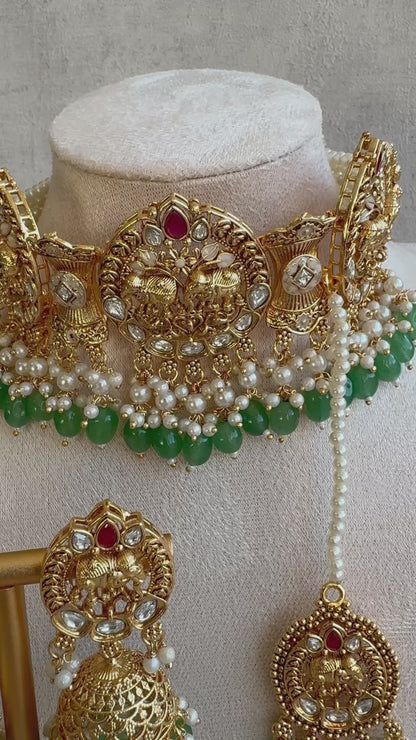 Ayura Designs Tanu Choker Set with Earrings & Tikka – A Golden Harmony of Pearls, Emerald Hues & Crimson Accents